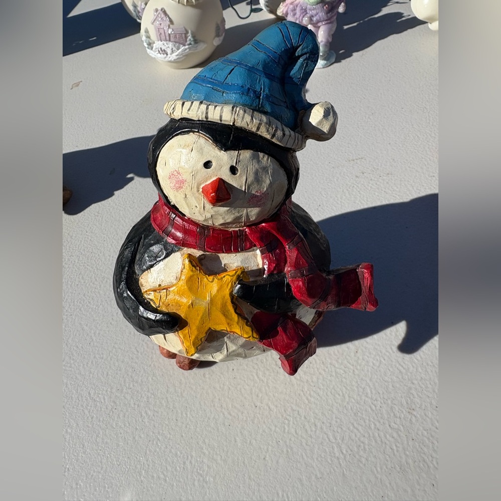 Festive Penguin Figurine with Blue Hat